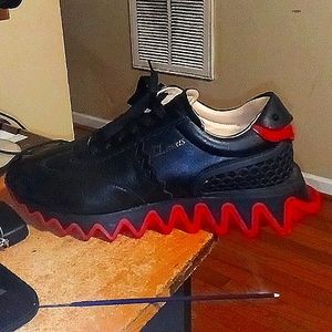 Christian lobs runner's like new size 9 (42)